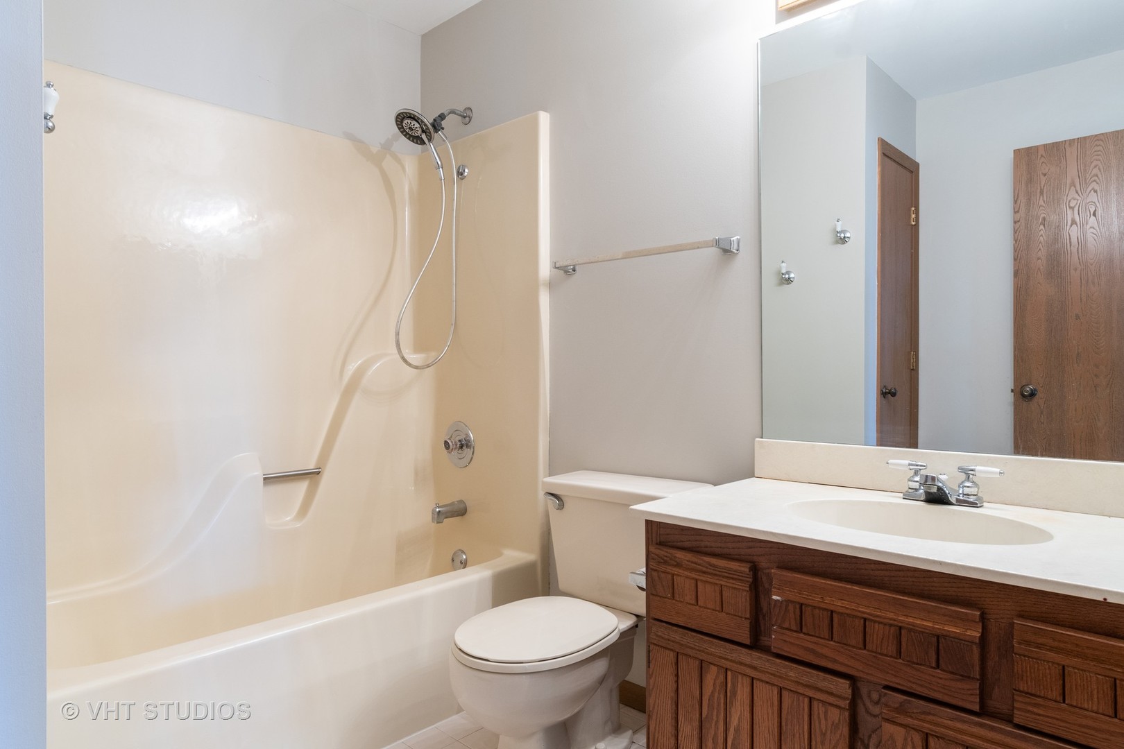1806 77th Street Naperville, IL 60565 - Photo 11 of 13 a bathroom with a sink a toilet and shower
