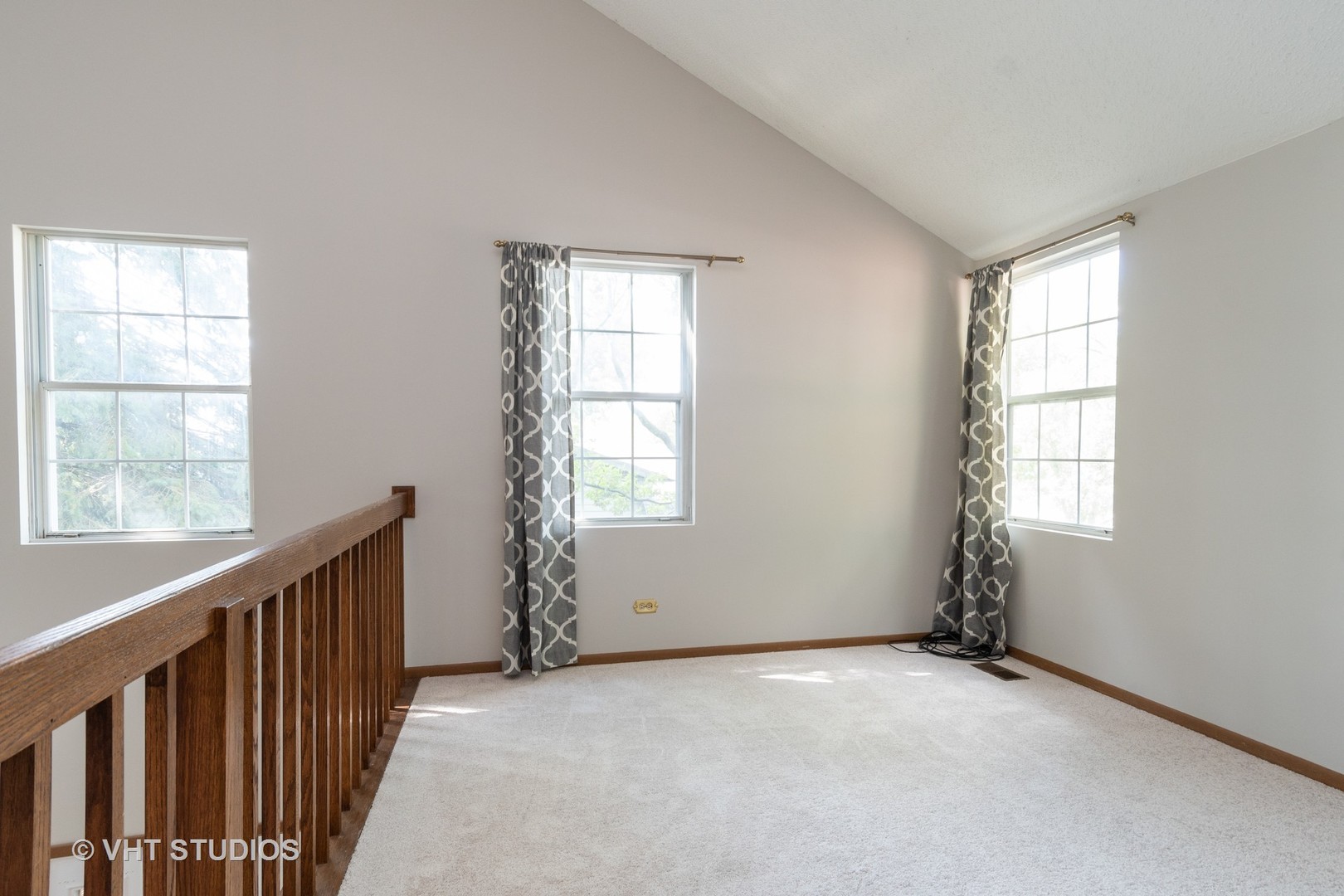 1806 77th Street Naperville, IL 60565 - Photo 9 of 13 an empty room with windows