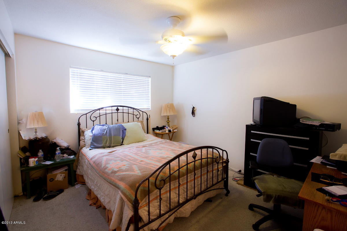 5525 East Thomas Road, Unit G9 Phoenix, AZ 85018 - Photo 6 of 13 Master Bedroom