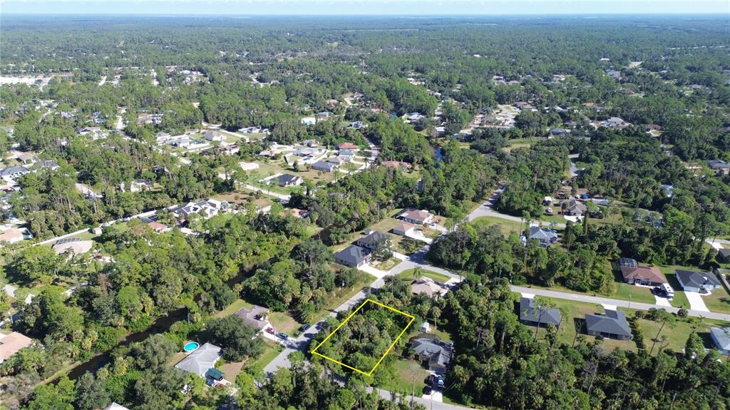 Alfred Rd Port North Port, FL 34286 - Photo 6 of 8 an aerial view of residential house with green space