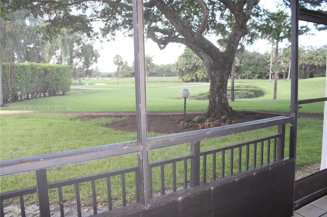 a view of outdoor space with swimming pool