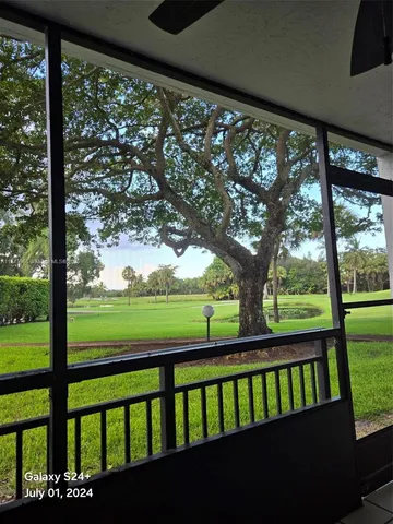 a plant that is in front of a door