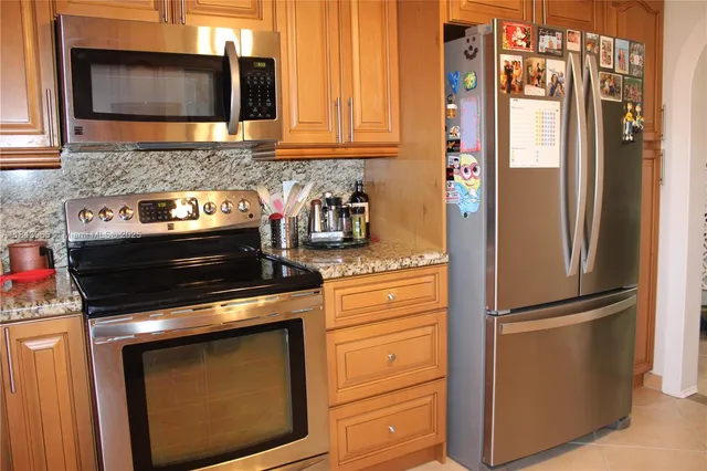 a bedroom with furniture and a gym equipment