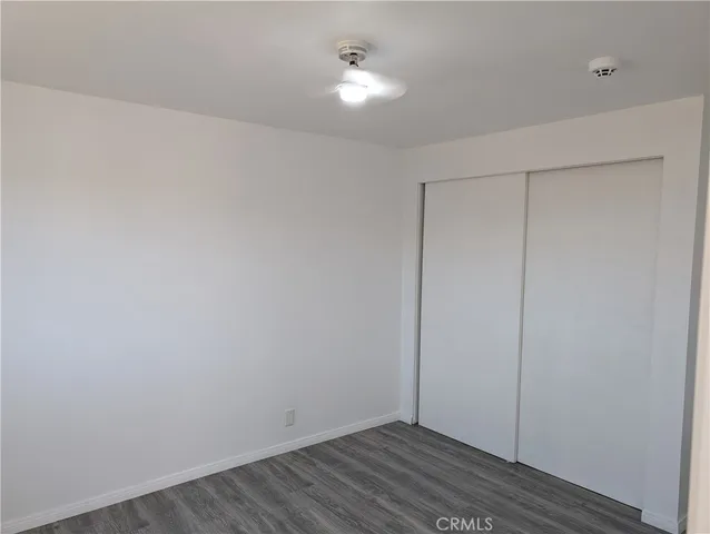 a kitchen with a sink cabinets and window