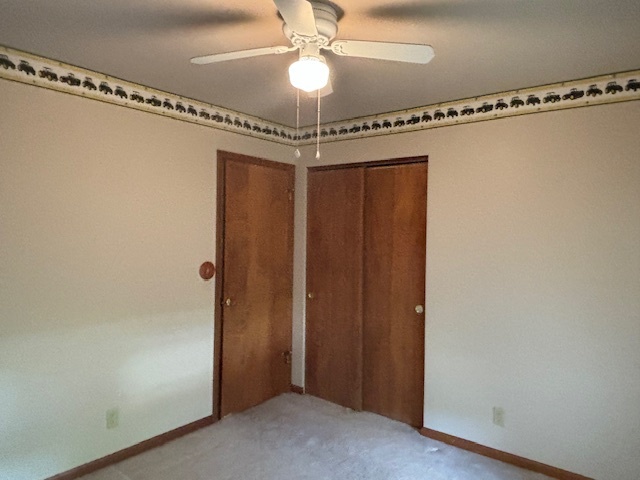5287 South Mill Pond Road Rochelle, IL 61068 - Photo 28 of 50 a view of a chandelier fan and closet in a room
