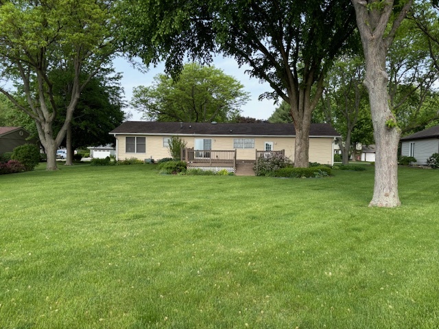 5287 South Mill Pond Road Rochelle, IL 61068 - Photo 42 of 50 a view of a house with a big yard and large trees