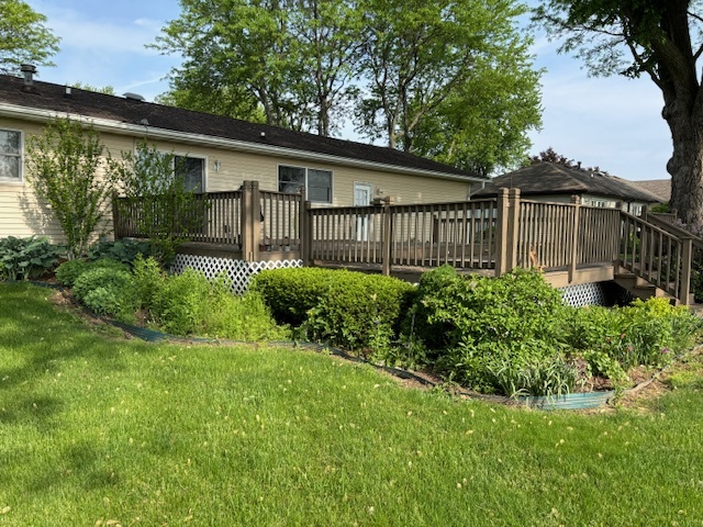 5287 South Mill Pond Road Rochelle, IL 61068 - Photo 46 of 50 a view of a house with a yard and plants