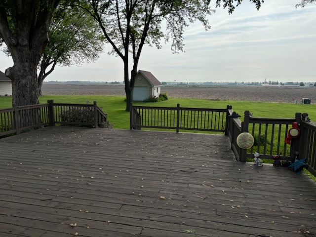 5287 South Mill Pond Road Rochelle, IL 61068 - Photo 47 of 50 a view of a lake with a bench in the background