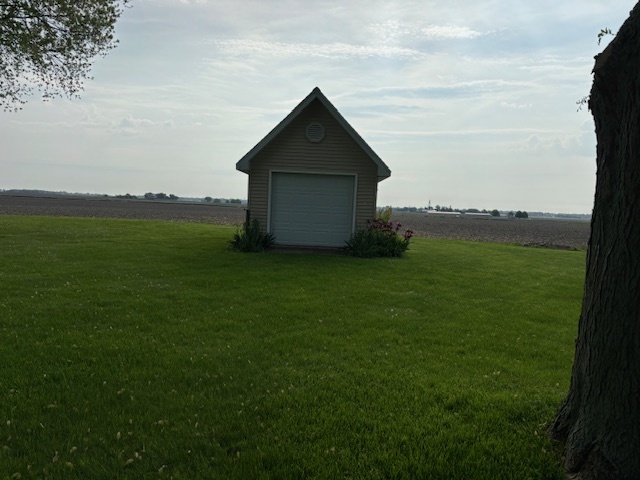 5287 South Mill Pond Road Rochelle, IL 61068 - Photo 50 of 50 a house with garden in front of it