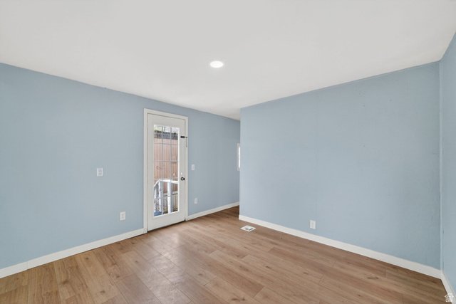 200 North Harrisville Road, Unit 37 Ogden, UT 84404 - Photo 4 of 14 Empty room with light wood-style floors and recessed lighting