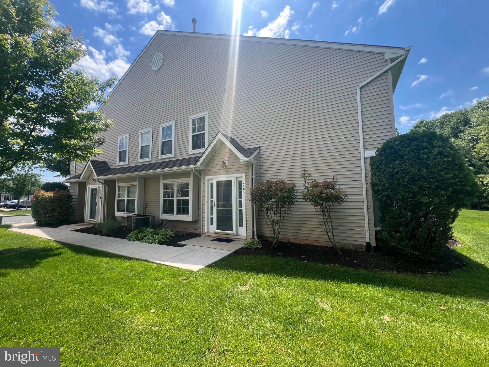 2003 Stokes Road Mount Laurel, NJ 08054 - Photo 1 of 7 a front view of a house with a yard and porch
