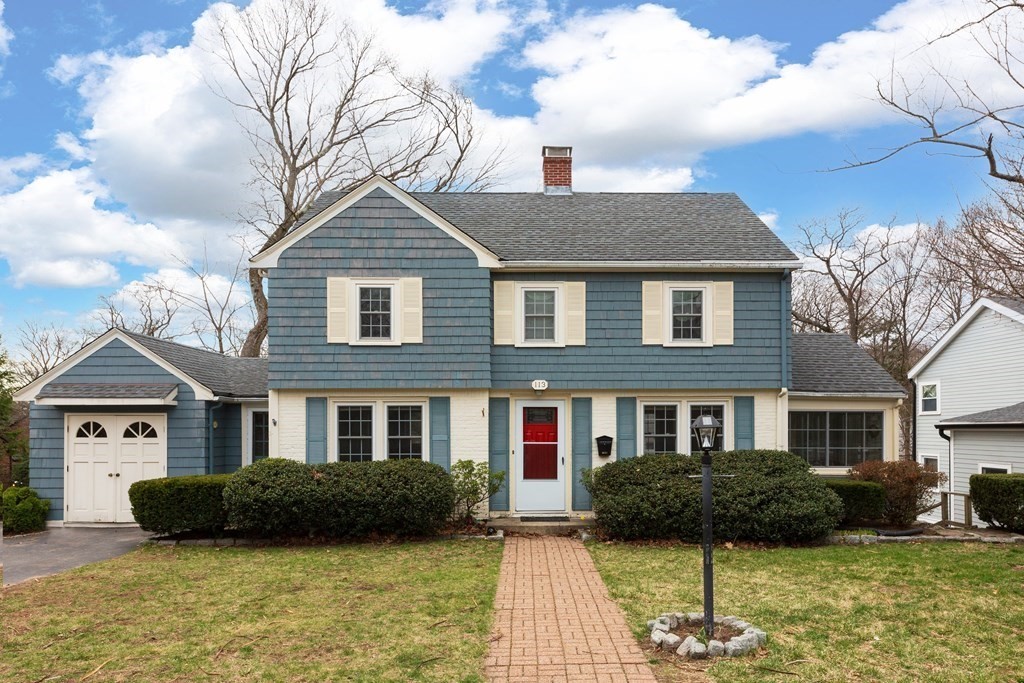 113 Payson Road Brookline, MA 02467 - Photo 1 of 16 a view of a brick house with a yard plants and large tree