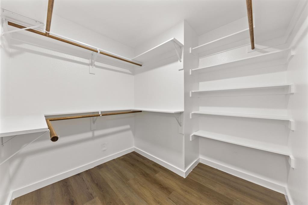 3227 Mayhew Drive Dallas, TX 75228 - Photo 18 of 25 a view of an empty walk in closet