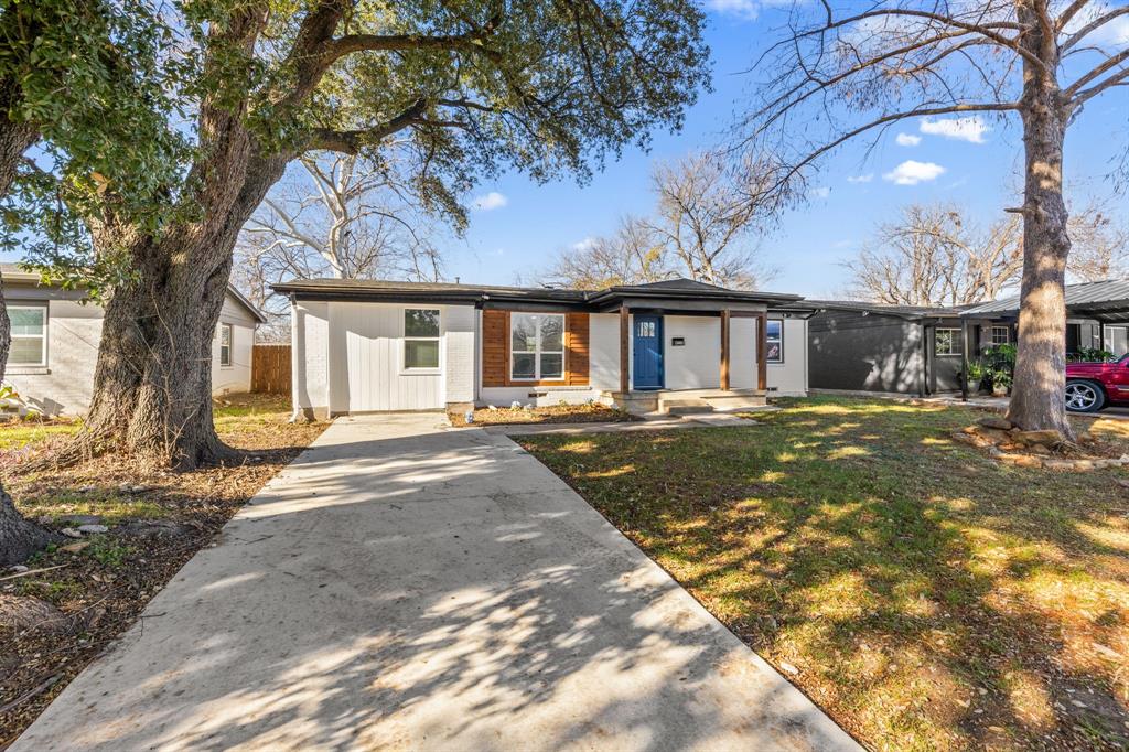3227 Mayhew Drive Dallas, TX 75228 - Photo 2 of 25 a front view of a house with a yard
