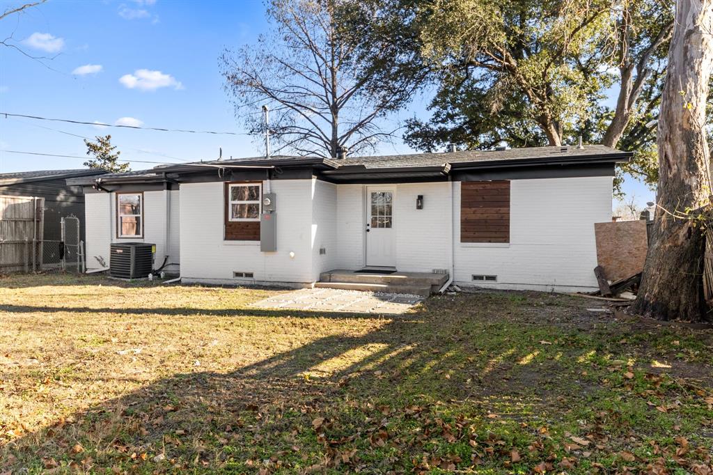 3227 Mayhew Drive Dallas, TX 75228 - Photo 24 of 25 a house that has a tree in front of it