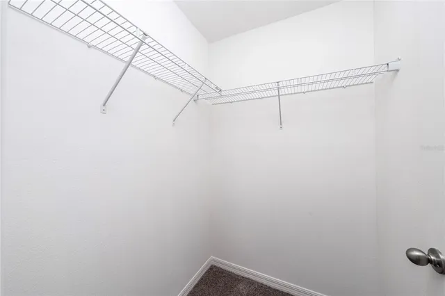 a view of a room with racks on the wall