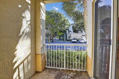 $345,000 | 100 Jacaranda Country Club Drive, Unit 101, Plantation, FL 33324