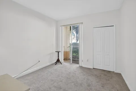 $345,000 | 100 Jacaranda Country Club Drive, Unit 101, Plantation, FL 33324