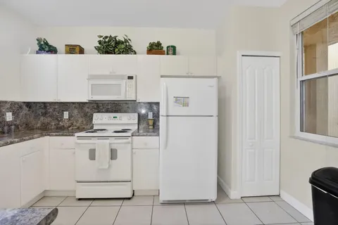 $345,000 | 100 Jacaranda Country Club Drive, Unit 101, Plantation, FL 33324