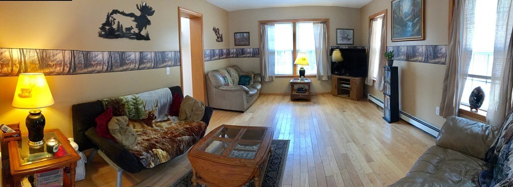 12 Sampson Road Huntington, MA 01050 - Photo 6 of 29 a living room with furniture and a fireplace