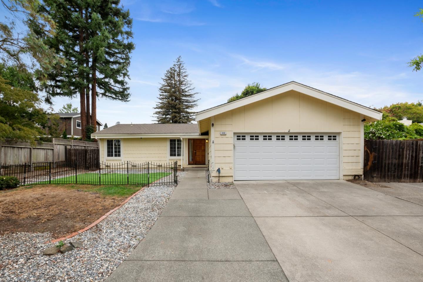 1091 Century Drive Napa, CA 94558 - Photo 2 of 53 a view of a house with a yard and large tree