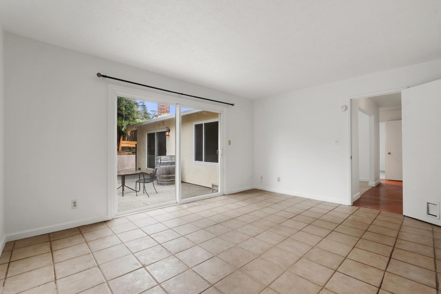 1091 Century Drive Napa, CA 94558 - Photo 40 of 53 a view of an empty room with glass door