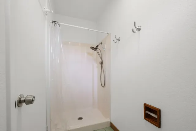 a view of a patio with a yard