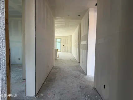 a view of a hallway to other door
