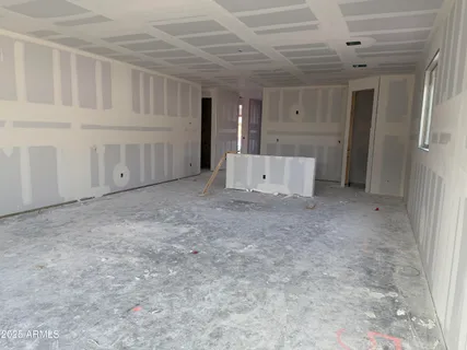 en empty room with windows