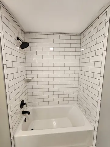 a bathroom with a bathtub