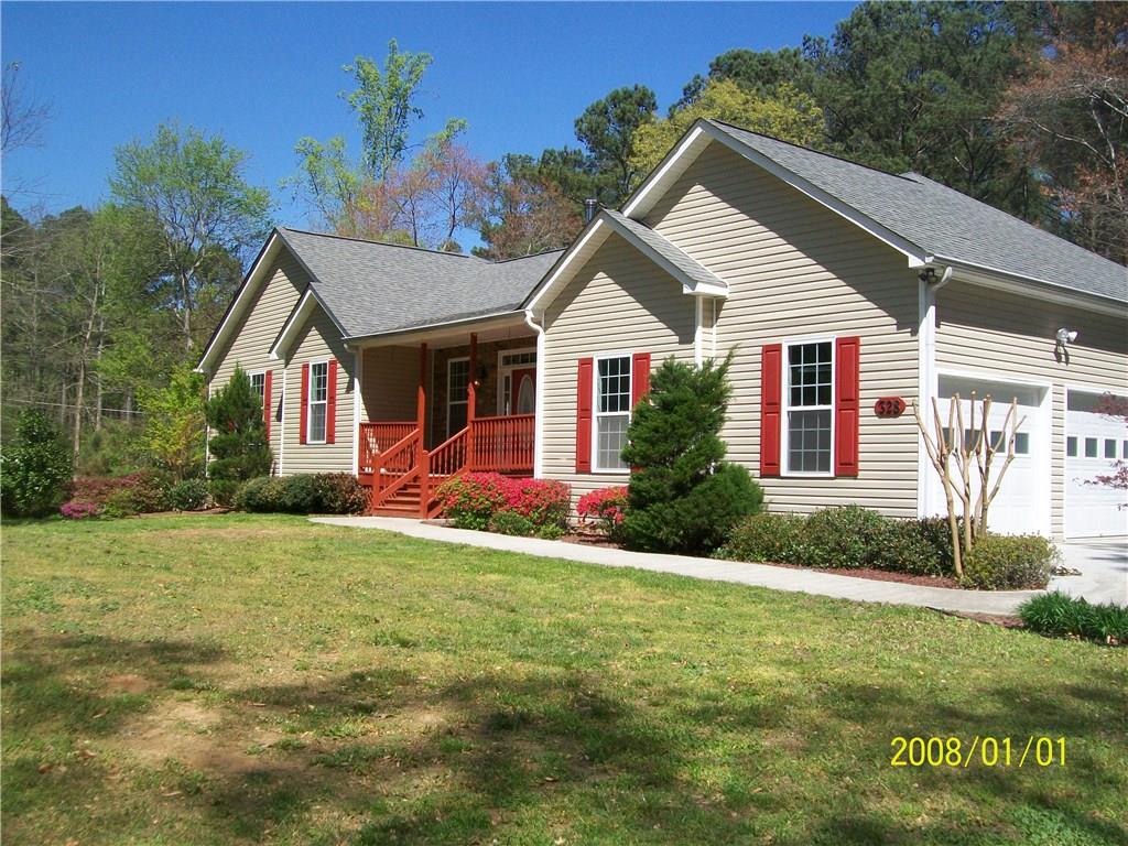328 Willie West Road Canton, GA 30114 - Photo 1 of 1 The first drive way brings you into the main level of this beautiful ranch home. Professionally landscaped and perfectly set upon the lot.