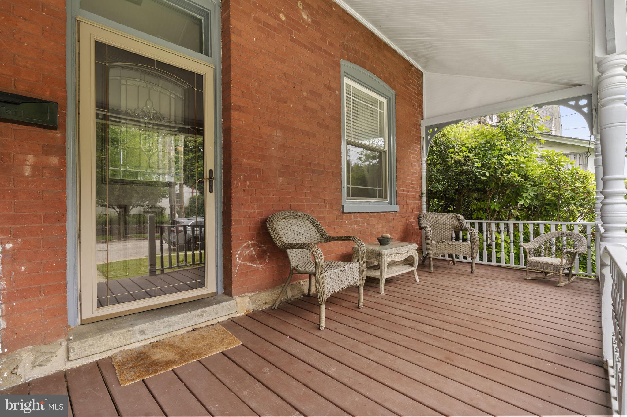 33 Waverly Road Wyncote, PA 19095 - Photo 2 of 28 a view of a chairs on the deck