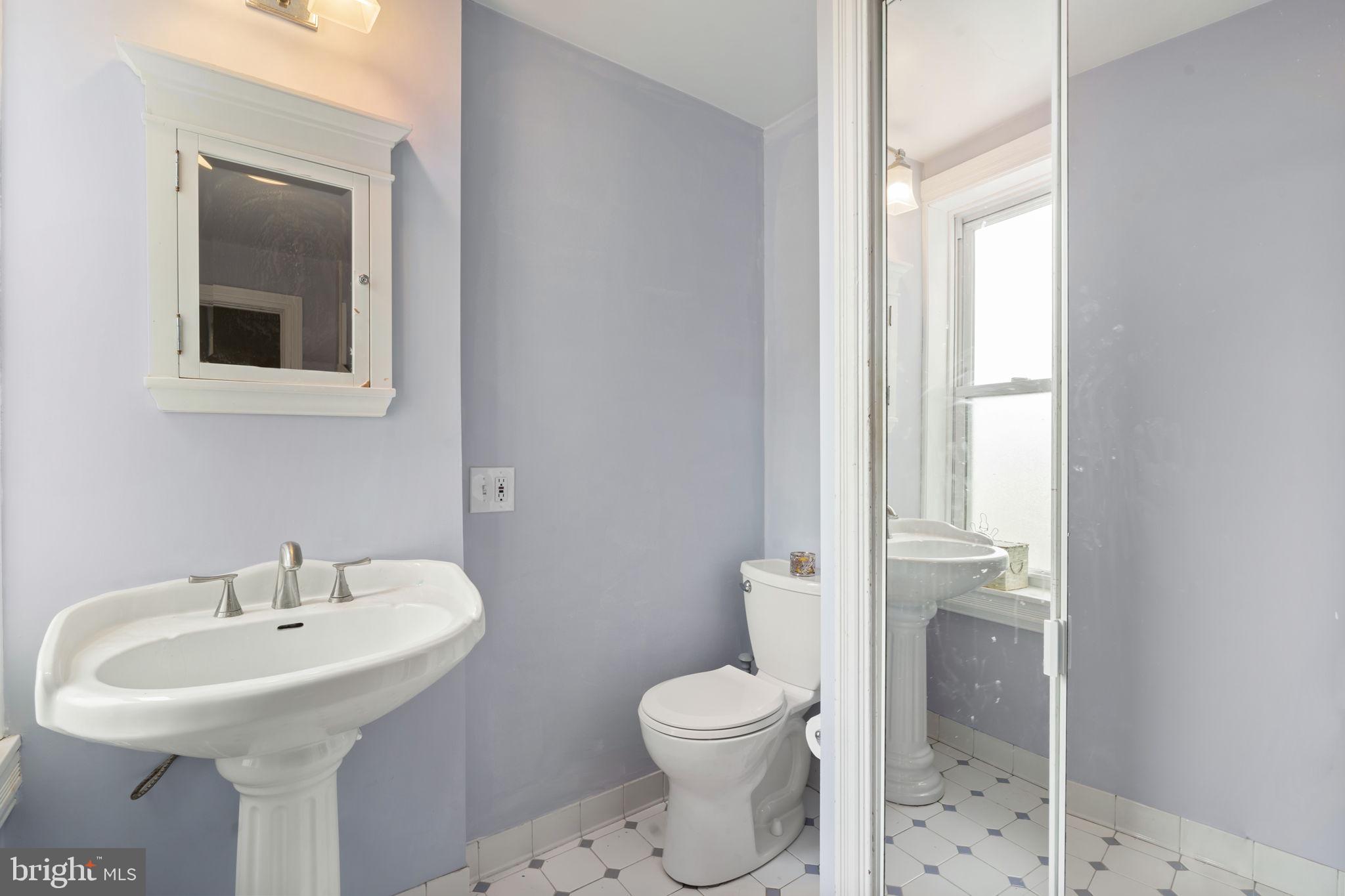 33 Waverly Road Wyncote, PA 19095 - Photo 22 of 28 a bathroom with a sink toilet and shower