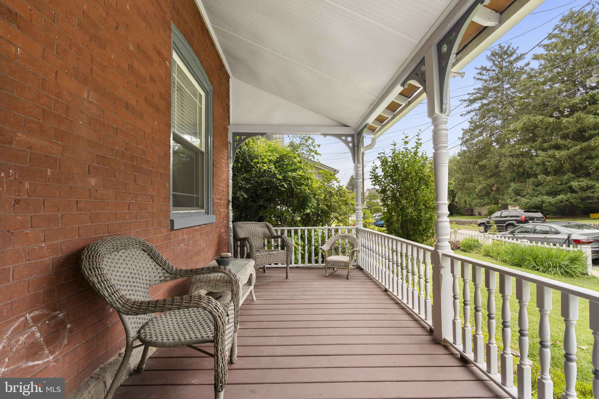 33 Waverly Road Wyncote, PA 19095 - Photo 3 of 28 a view of a chair and tables in the balcony