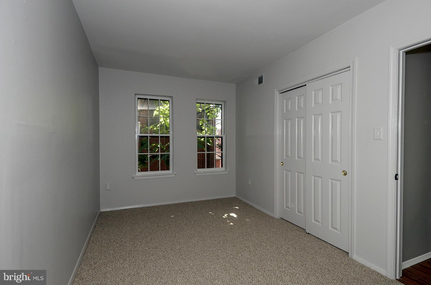 1730 16th Street Northwest, Unit 14 Washington, DC 20009 - Photo 12 of 17 a view of an empty room with window