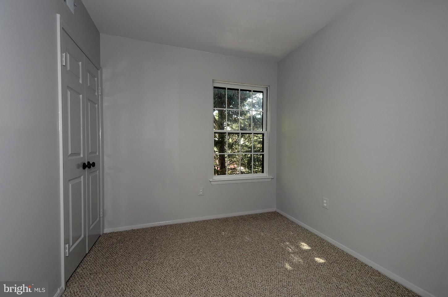1730 16th Street Northwest, Unit 14 Washington, DC 20009 - Photo 15 of 17 an empty room with windows