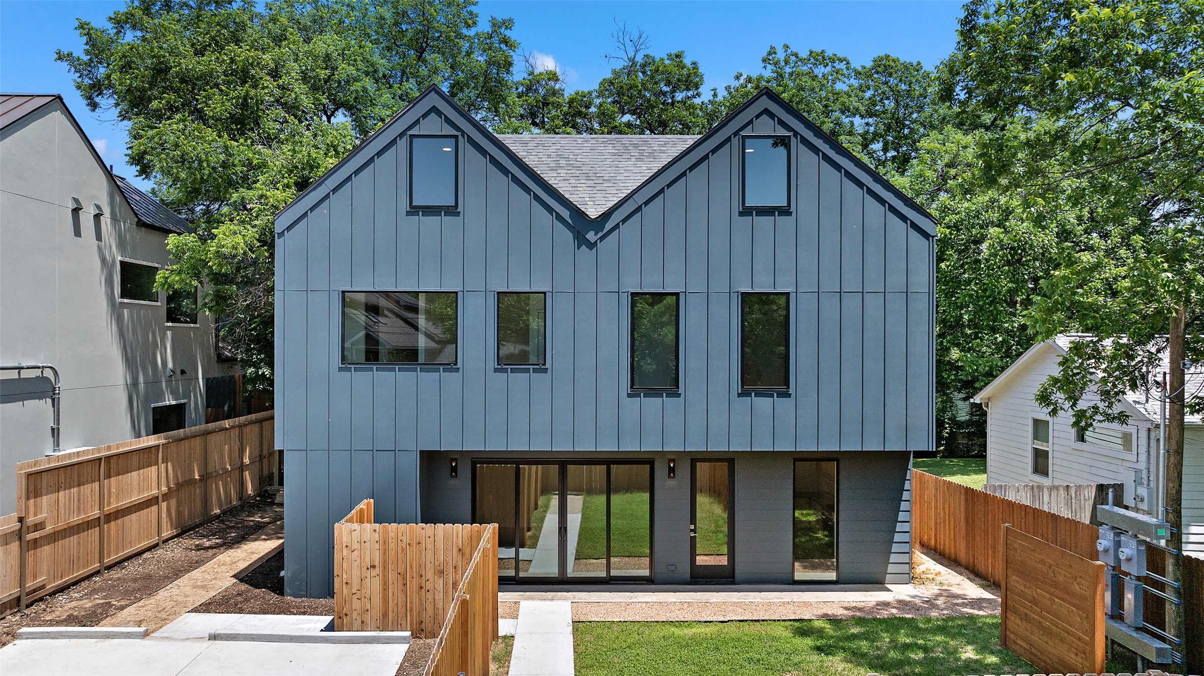 2107 Maple Avenue, Unit A Austin, TX 78722 - Photo 1 of 1 a front view of a house with garden