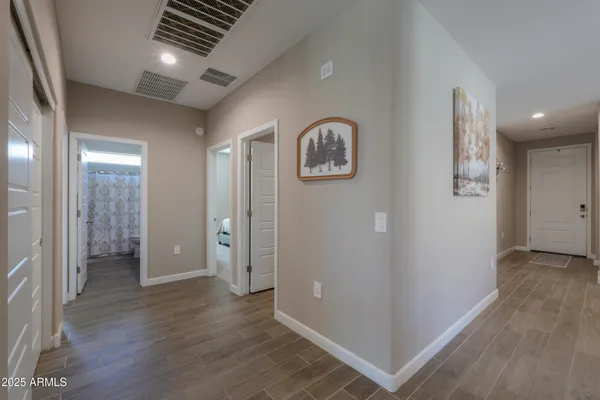 a view of entryway with kitchen and hallway