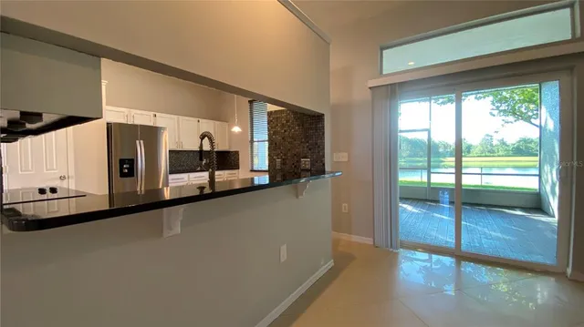 a view of a large mirror and stairs