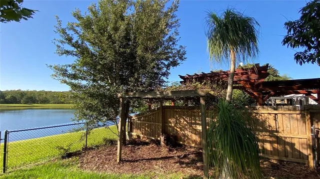 a view of a backyard of the house