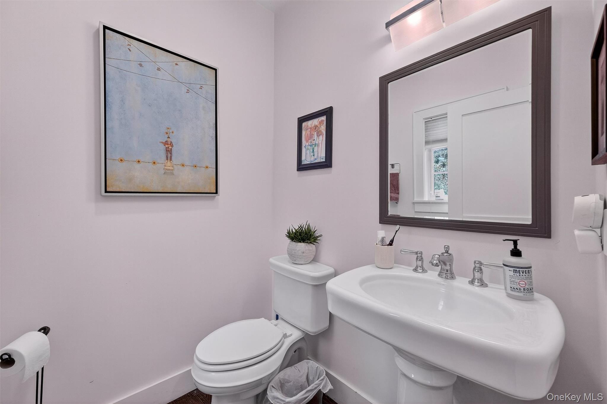 669 Highway 213 Rosendale, NY 12472 - Photo 15 of 34 a bathroom with a toilet a sink and mirror