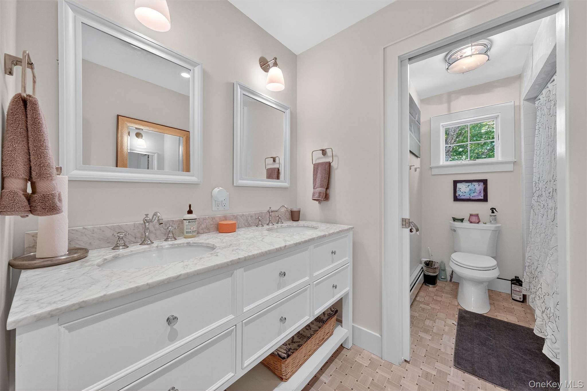 669 Highway 213 Rosendale, NY 12472 - Photo 21 of 34 a bathroom with a granite countertop toilet sink and mirror
