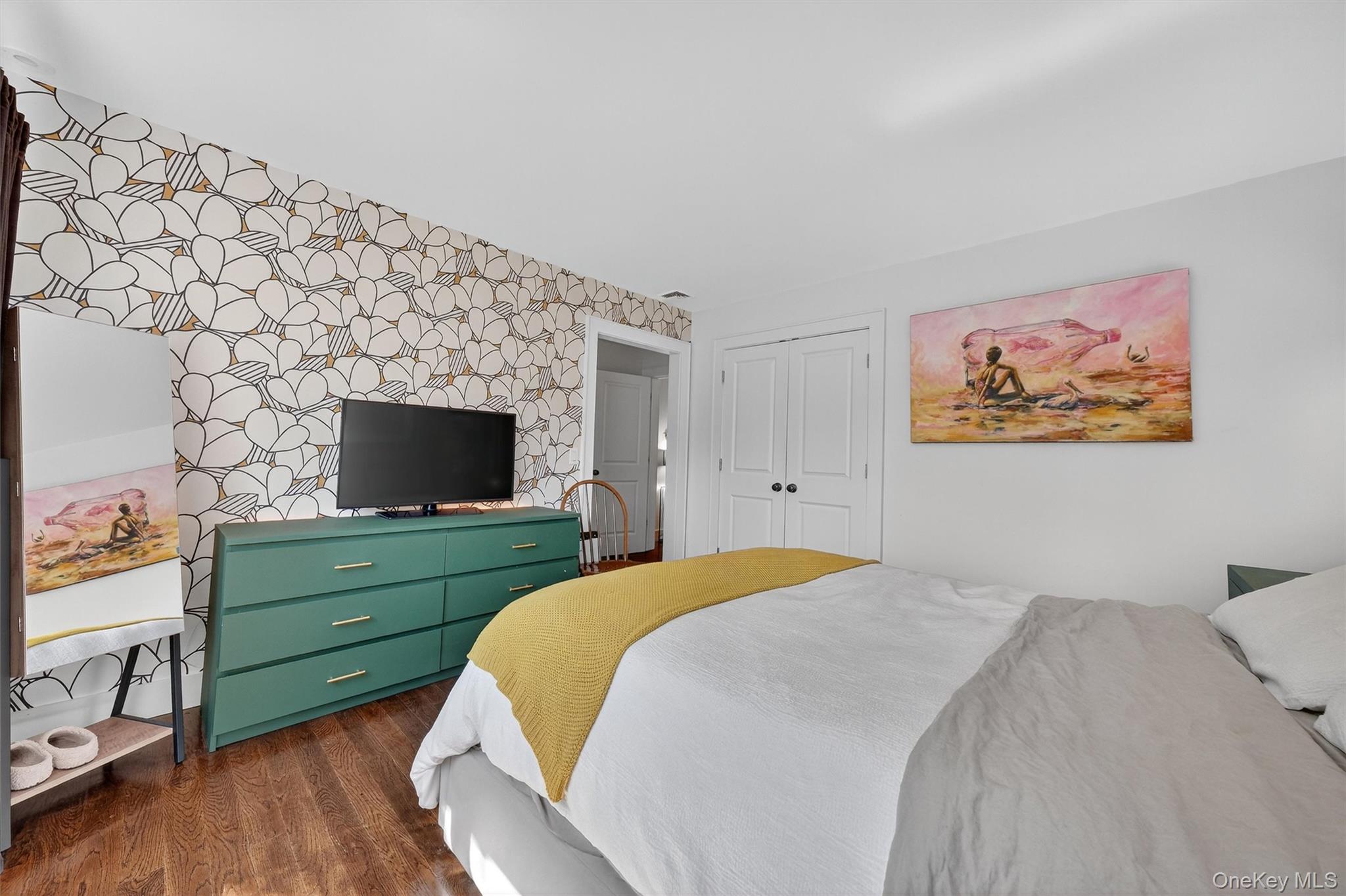 669 Highway 213 Rosendale, NY 12472 - Photo 25 of 34 a bedroom with a bed and a flat screen tv