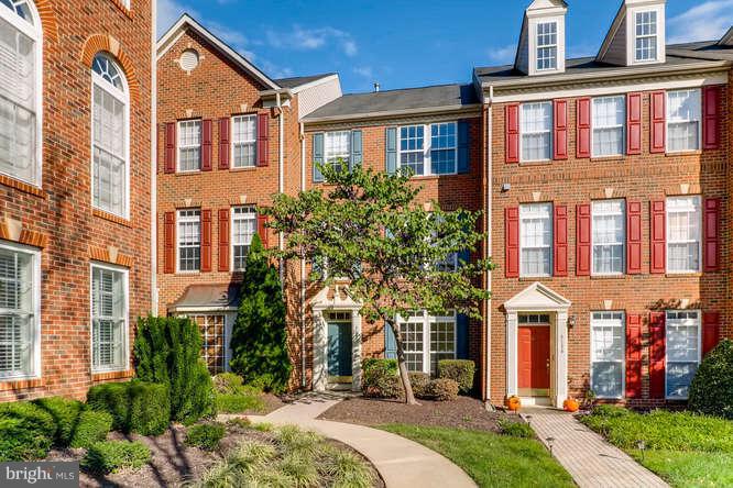 5136 Key View Way Perry Hall, MD 21128 - Photo 1 of 28 a front view of a building with a garden