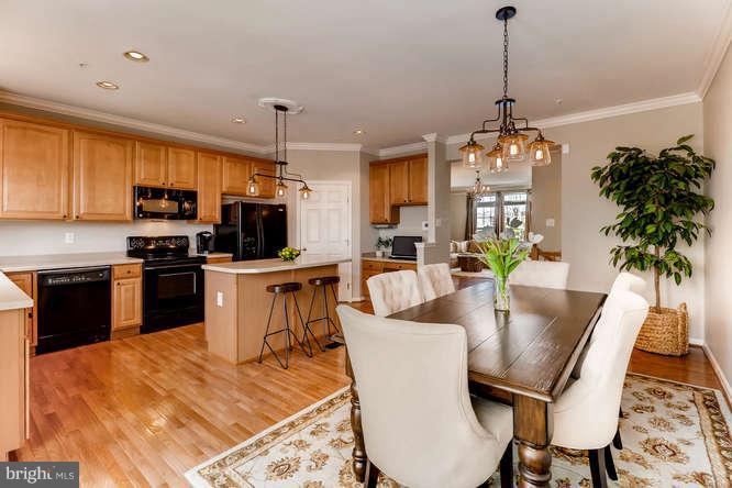 5136 Key View Way Perry Hall, MD 21128 - Photo 12 of 28 a view of a dining room with furniture kitchen and chandelier