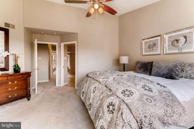 5136 Key View Way Perry Hall, MD 21128 - Photo 19 of 28 a bedroom with a bed and a chandelier