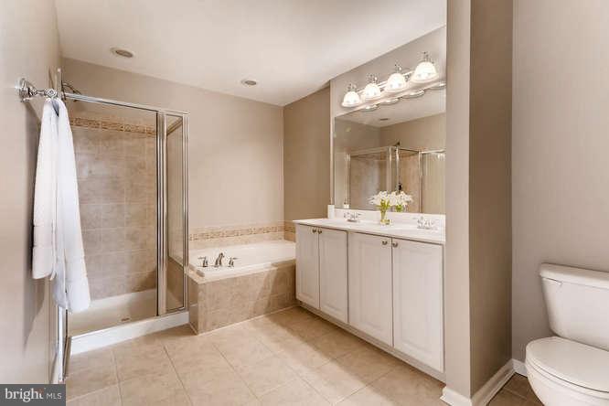 5136 Key View Way Perry Hall, MD 21128 - Photo 20 of 28 a bathroom with a sink a toilet and shower