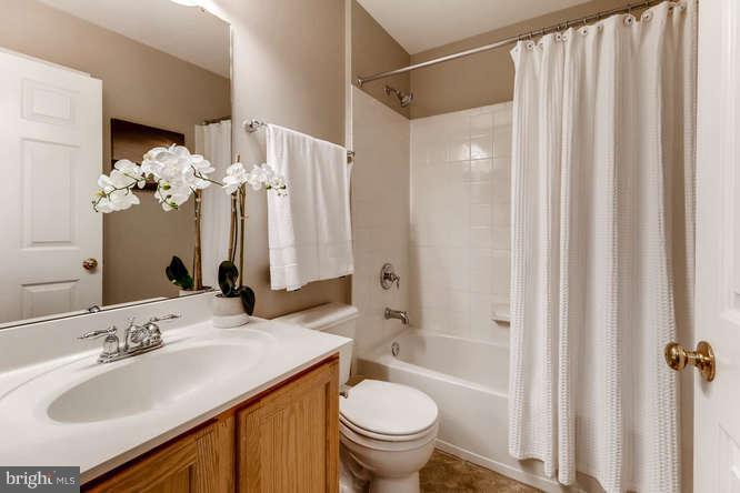 5136 Key View Way Perry Hall, MD 21128 - Photo 23 of 28 a bathroom with a sink toilet and shower