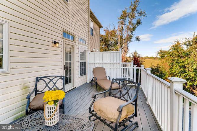 5136 Key View Way Perry Hall, MD 21128 - Photo 25 of 28 a balcony view with two chairs and a potted plant