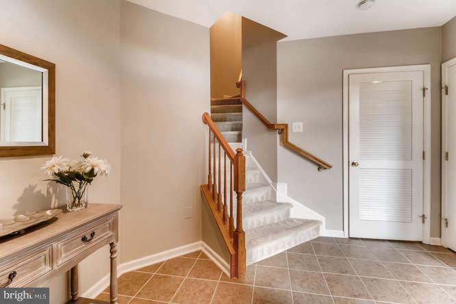 5136 Key View Way Perry Hall, MD 21128 - Photo 4 of 28 a view of an entryway with wooden floor and staircase